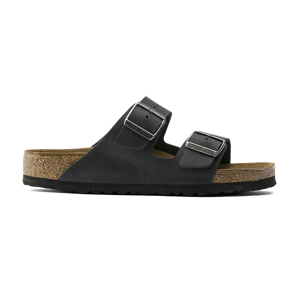 Birkenstock Arizona Soft Footbed Black Oiled Leather Two Strap Slip On Sandal Slide, light brown cork footbed with dark brown sole | Side view | Simons Shoes 