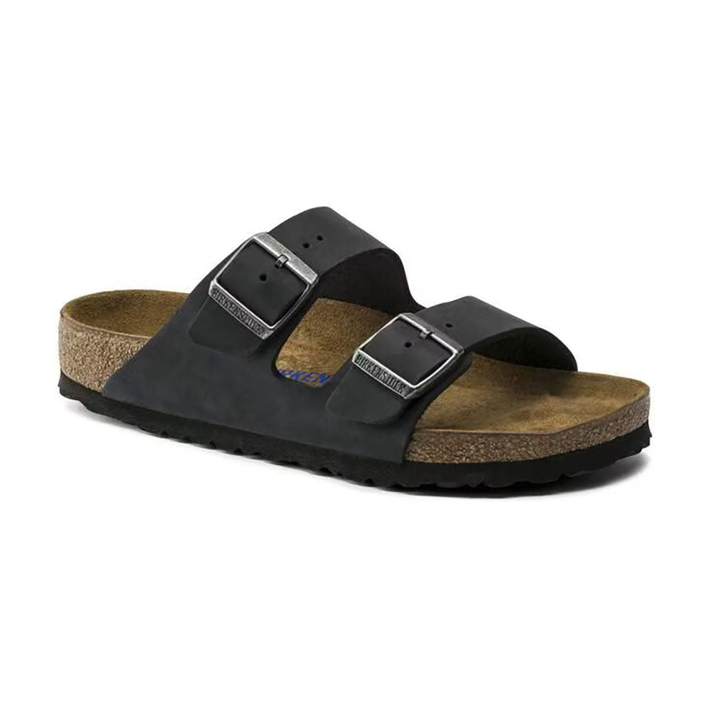 Birkenstock Arizona Soft Footbed Black Oiled Leather Two Strap Slip On Sandal Slide, light brown cork footbed with dark brown sole | Side view | Simons Shoes 
