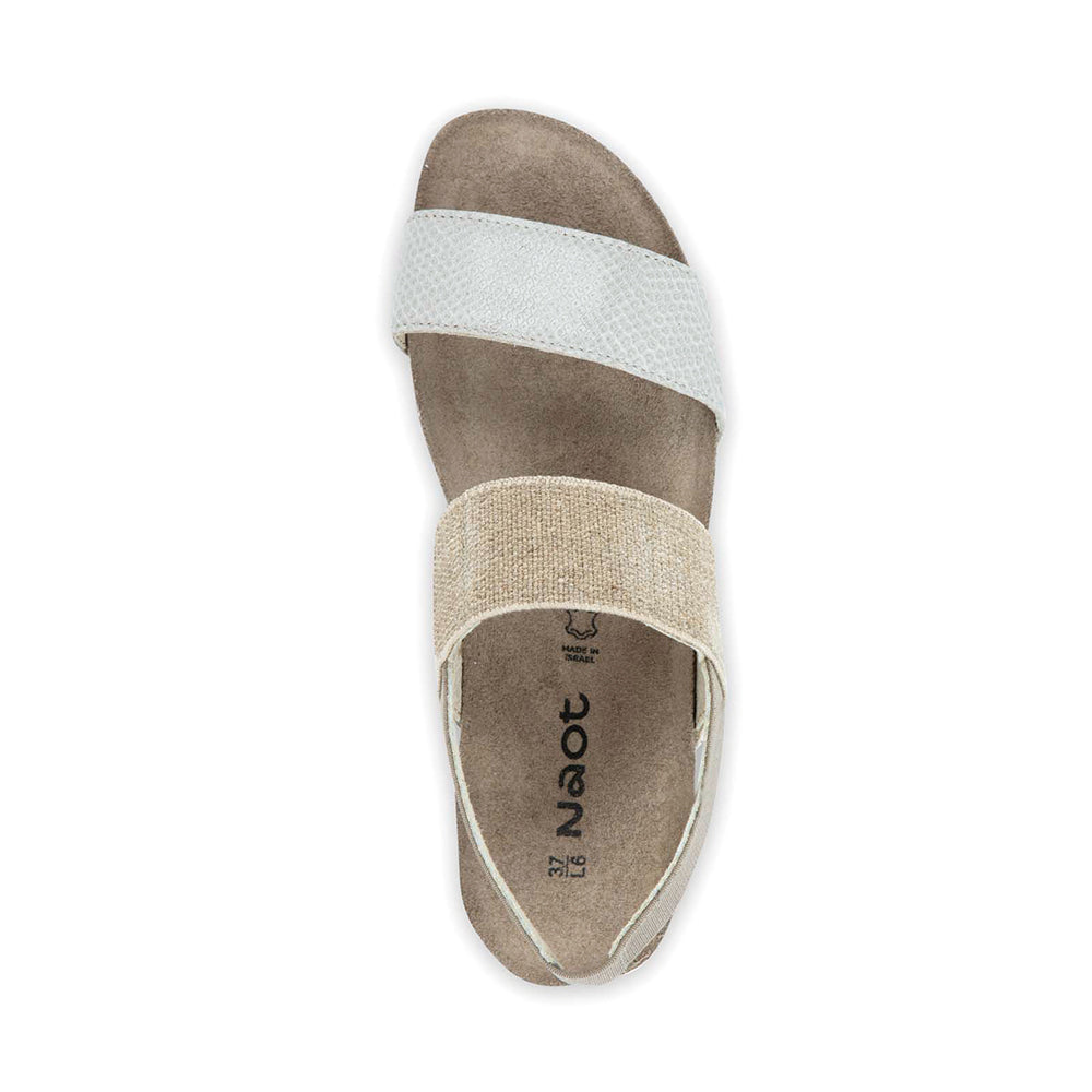 Naot Amy Sandal with stretch strap around the ankle and top of foot, and single strap above the toe. Ankle strap is beige and toe strap is white leather. Footbed is brown and sole is darker brown. | Above view | Simons Shoes